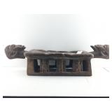 African origin of a large serving tray or a stool