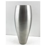 This is a brushed stainless steel vase featuring