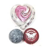 Hand blown glass heart paperweight, stone sphere
