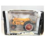 SpecCast Collectibles die cast tractor in box.
