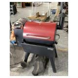 Traeger wood pellet red grill, approx 36in long