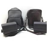 2 Polaroid cameras with totes.