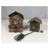 2 Wooden Cuckoo clocks, 1 carved w/animals