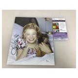 An autographed picture of Leanne Rimes signed and