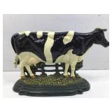 Cast Iron.  Cow door stop.   Standing along a