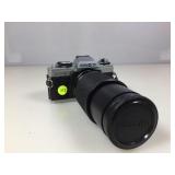 A Minolta XGM working camera with leather