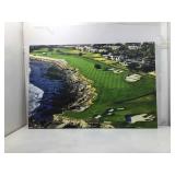 This framed aerial photo displays the iconic 18th