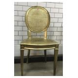 Gold-colored wicker chair