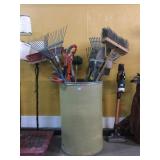 Large collection of gardening tools, some