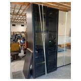 Dark Brown tall Cabinet w/shelves and glass