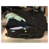 Luggage Full of Clothes.