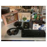 Logitech Keyboard, Skull Candy Headphones,
