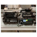 4 Car Radios. 3 Ford & 1 Delco.