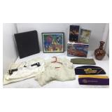 Box lot of nine various items a black folder