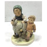 A Hummel figure by Goebel of West Germany of two