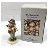 a Hummel  figure in the original box made by