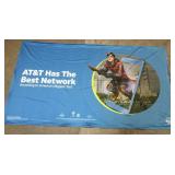 A very large, colorful banner, advertising AT&T