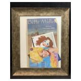 This framed Bette Midler memorabilia likely