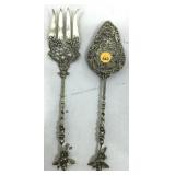 This is a very ornate fork and spoon pair, made