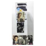 A box full of collectible Elvis Presley cards.