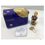 a Hummel figure in the original box made by