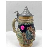 This is a vintage German beer Stein featuring a