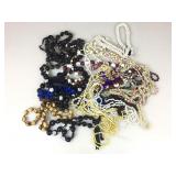 Beaded & Shell Necklaces and Kukui Nut Leis.