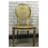Gold-colored wicker chair