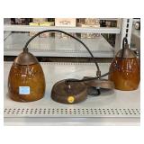 2 Hanging Brown Swirl Light Fixtures.