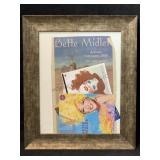 This framed Bette Midler memorabilia likely