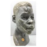 This antique style sculpture bust features the