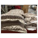 Matching pillow, comforter, and sheet set.