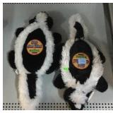 2 Skunk Whoopie Cushions.