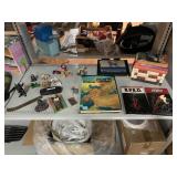 Collectible Lighters, Figures, and Books.