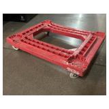 Red plastic dolly, approx 22x29in