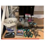 Assorted Plumbing Pieces, Lawn Supplies, and