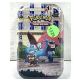 Sealed Pokï¿½mon tins with cards