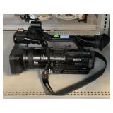 Some camera recorder HDV 1080i mini DV with strap