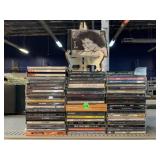 Mix CDï¿½s rap, R&B and rock, some signed by artist