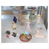 Porcelain figurines dolls, dog, duck vase one