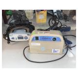 Two electric plug in respirators with power cords