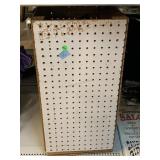 Rotating Peg Board Style Display.