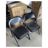 8 Folding metal chairs, 6 are in box
