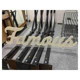 Famous Wood cutout word in plexiglass stand,