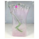 A vintage pink blown glass handkerchief vase