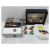A small box lot of paw patrol items in a frame