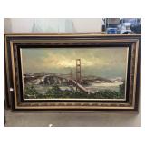 This framed oil painting is a vintage coastal