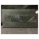 This piece is a black rectangular wall art panel