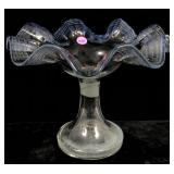 This is a hand blown art glass pedestal bowl with