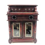 Crafted as a miniature wooden upright piano or a